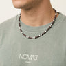 collar surfero tierra