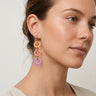 pendientes con aros en colores anaranjados y lilas