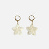 pendientes de flor color marfil