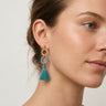pendientes con aro dorados y borlas en color verde agua y lila