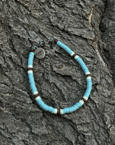 pulsera azul celeste
